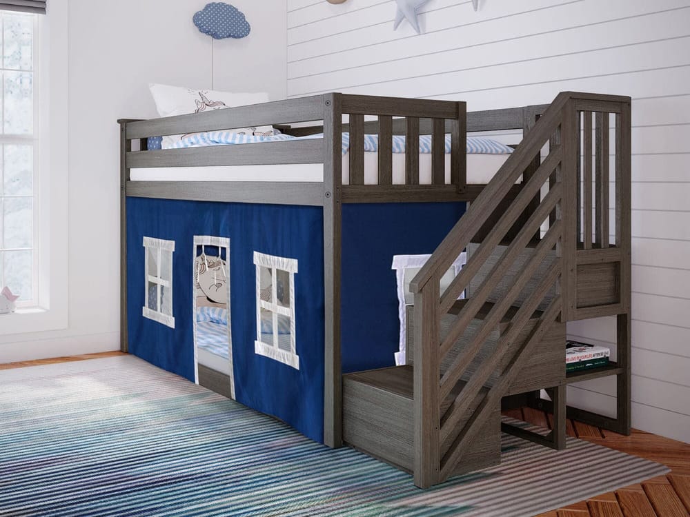 Classic Twin Over Twin Low Bunk Bed with staircase and blue under bed curtain in clay finish.